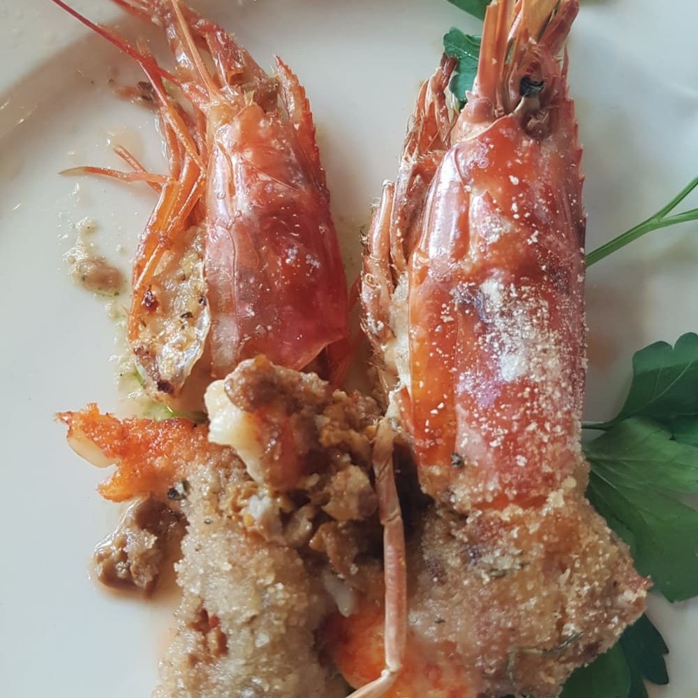 Secondi piatti di pesce. Ristorante Trevisani, mura storiche di Bassano del Grappa